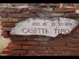 05279 ostia - regio iii - insula xii - insula xiii - casette tipo (iii,xii,1-2 - iii,xiii,1-2) - schild - 09-2023.jpg